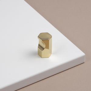 Hexagonal polished brass cupboard handle