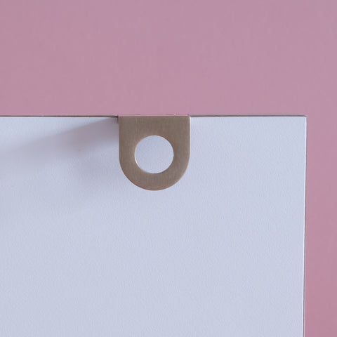 Symbols handle collection in brushed satin brass