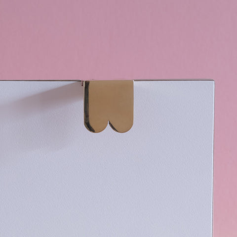 Symbols handle collection in polished brass