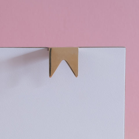 Symbols handle collection in polished brass